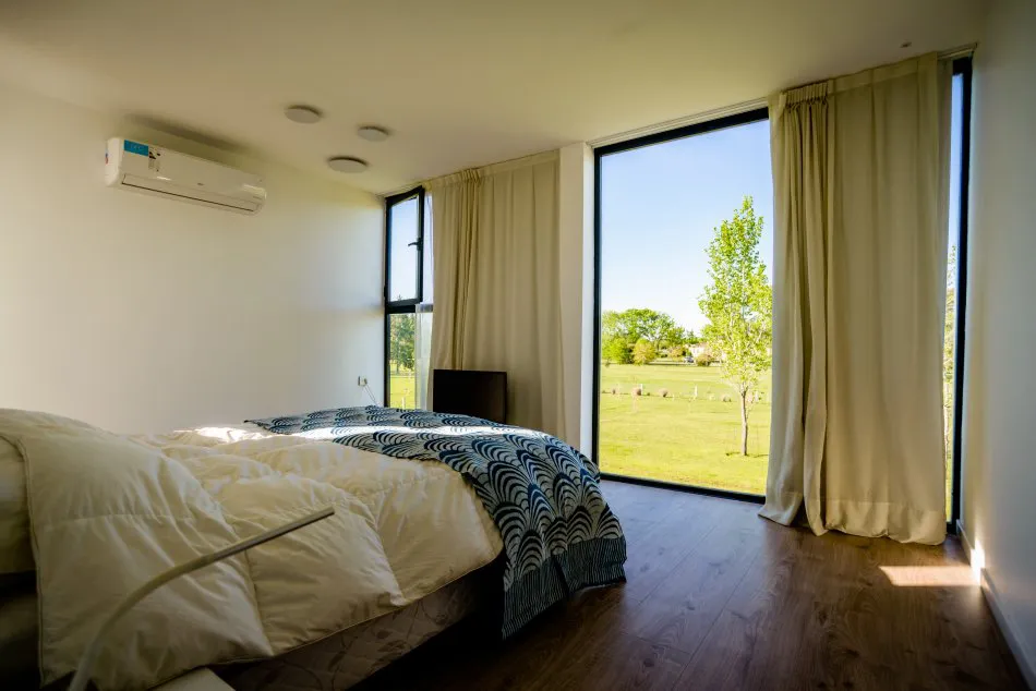 7 Contenedores, 1 Casa