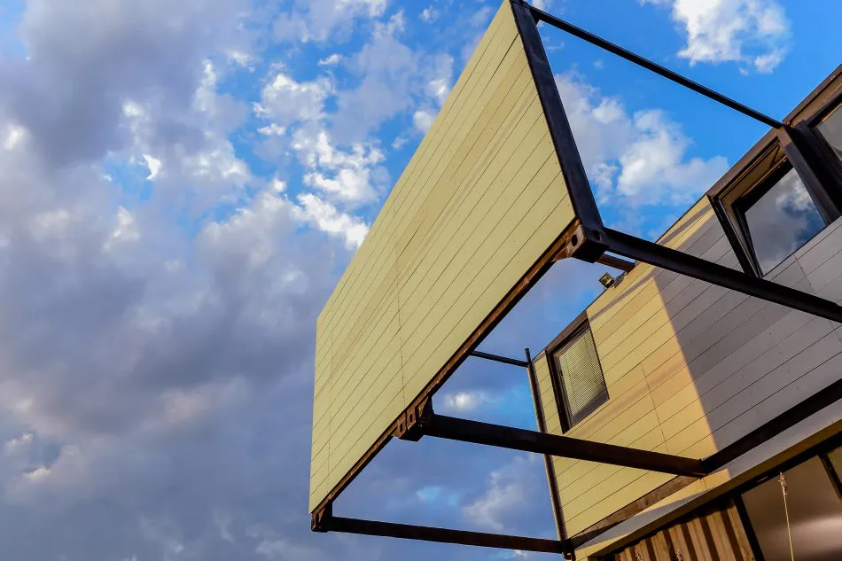 7 Contenedores, 1 Casa